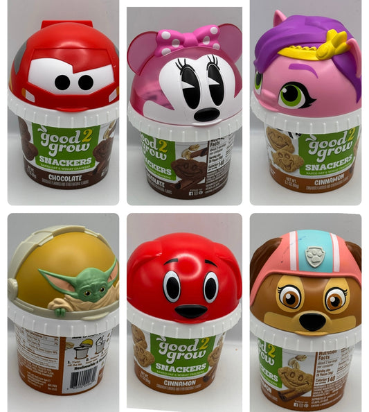 Good 2 Grow Snackers Baked Wheat & Oat Crackers Chocolate or Cinnamon with reusable snack tub and character head lid.