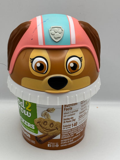 Good 2 Grow Snackers Baked Wheat & Oat Crackers Chocolate or Cinnamon with reusable snack tub and character head lid.