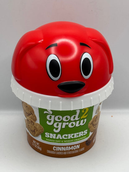 Good 2 Grow Snackers Baked Wheat & Oat Crackers Chocolate or Cinnamon with reusable snack tub and character head lid.