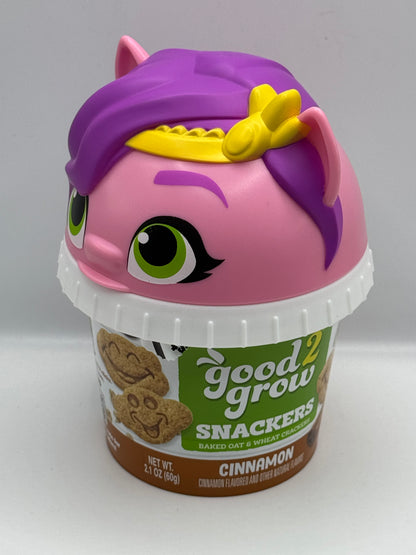 Good 2 Grow Snackers Baked Wheat & Oat Crackers Chocolate or Cinnamon with reusable snack tub and character head lid.